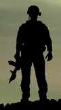 Silhouetted combat soldier